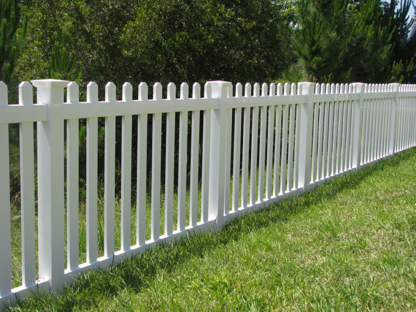 contemporary vinyl picket fence with wide space and new england caps