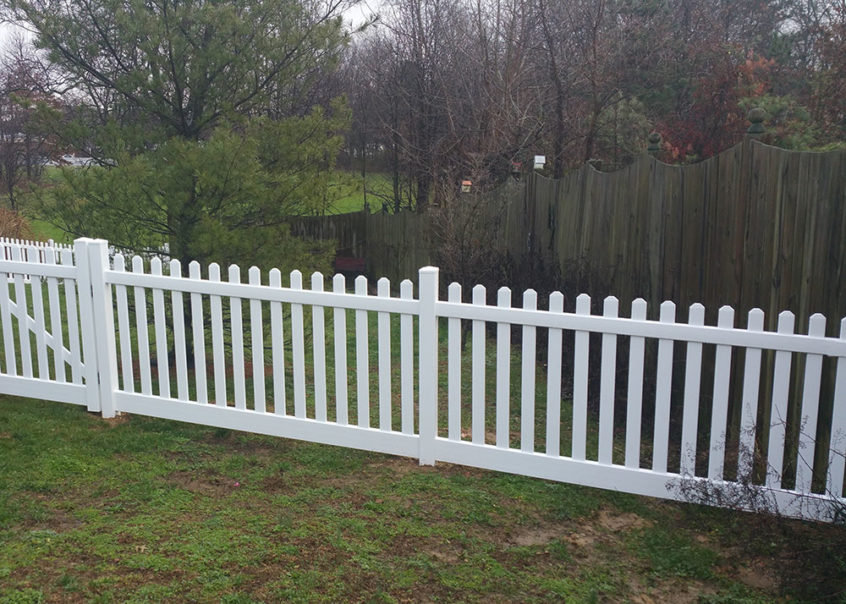 contemporary vinyl picket fence with wide space and standard caps