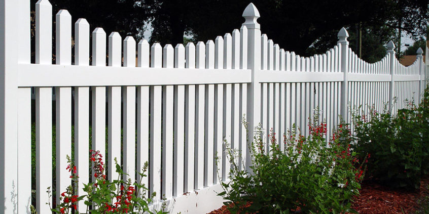 vinyl contemporary picket fence with dip and narrow space with gothic caps